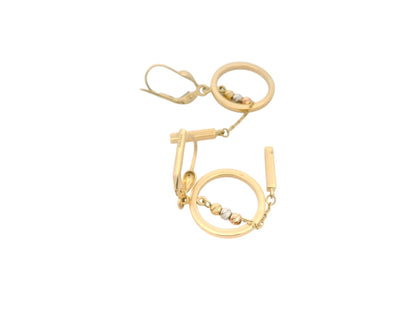 Cercei Antonia Gold din aur de 14K cu design geometric, sfere texturate și elemente mobile suspendate pe lănțișor fin.