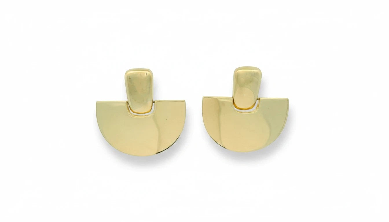 Antonia Gold geometric half moon stud earrings in polished gold-tone metal with a modern architectural design.